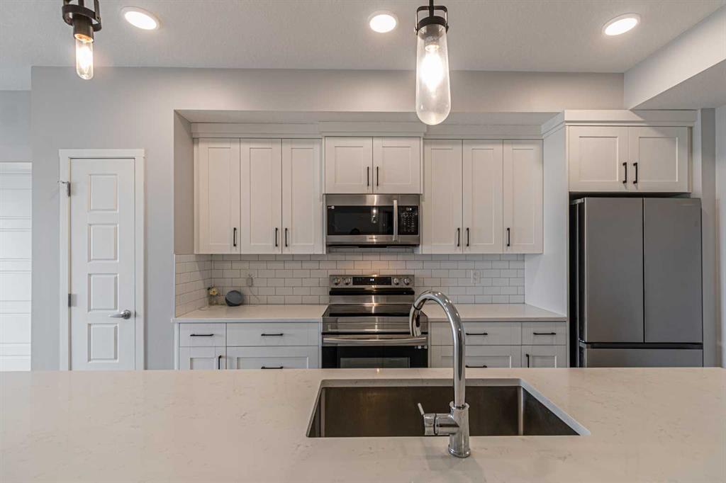 203-360 Harvest Hills Way NE